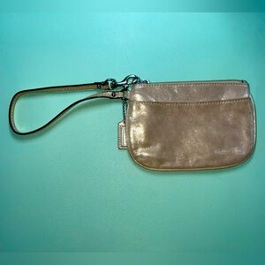 Coach gold wristlet